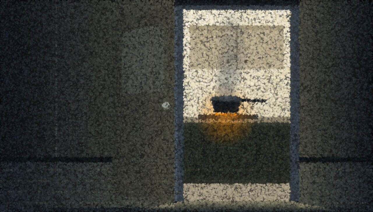 A lit kitchen seen through a dark hallway doorway, with a pan smoking on the hob and nobody in the room.