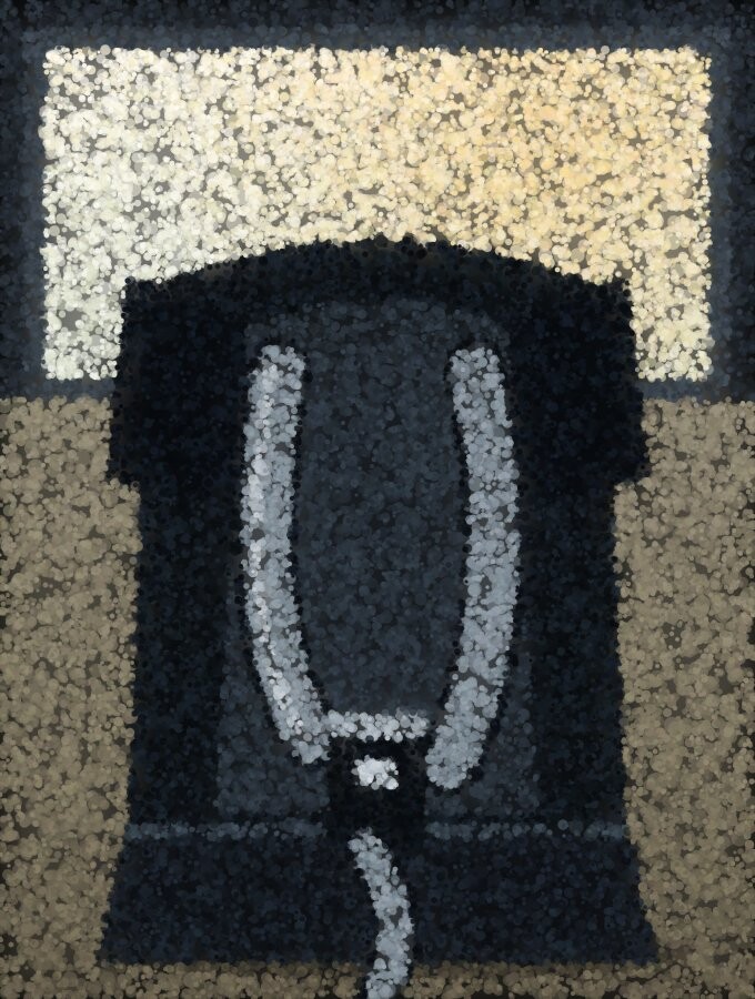 A child car seat seen from the front with its harness straps hanging loose.