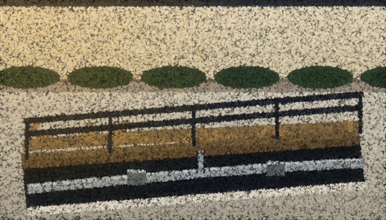 A narrow trench cut across a pavement outside a house with a dull grey service pipe exposed along the bottom.