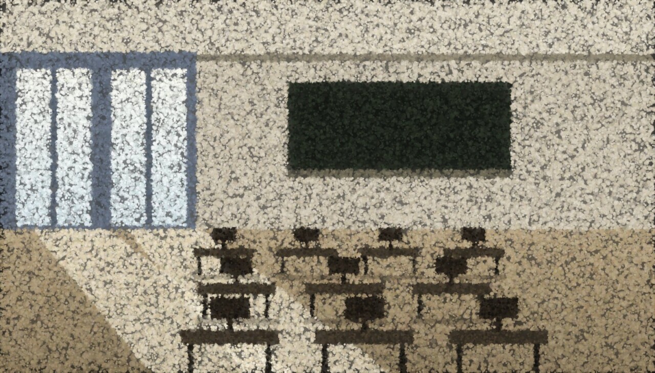An empty classroom with tall windows on one side, a dark board and rows of desks, morning light falling across the floor.