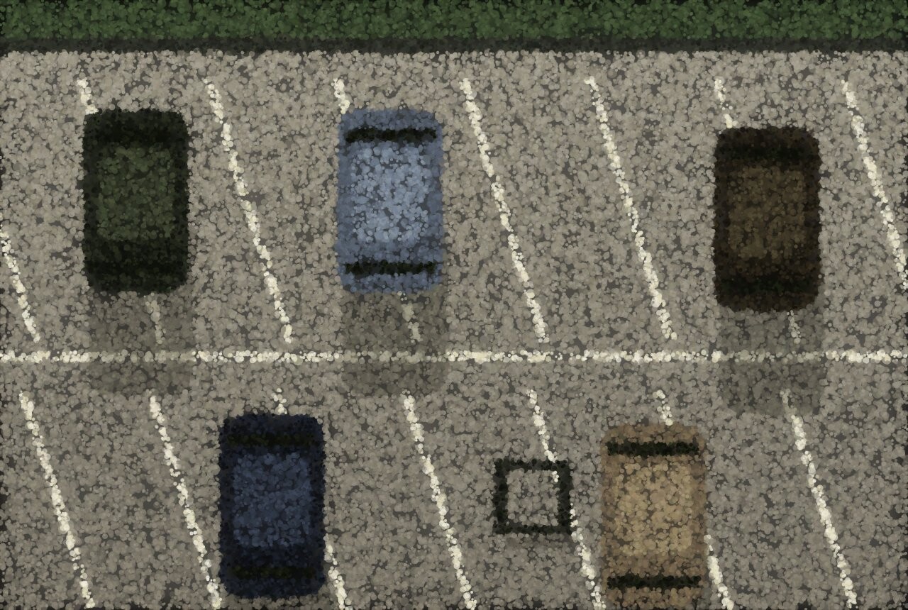 A car park seen from above: painted bays running at an angle, five cars parked, one bay empty with a trolley left in it.
