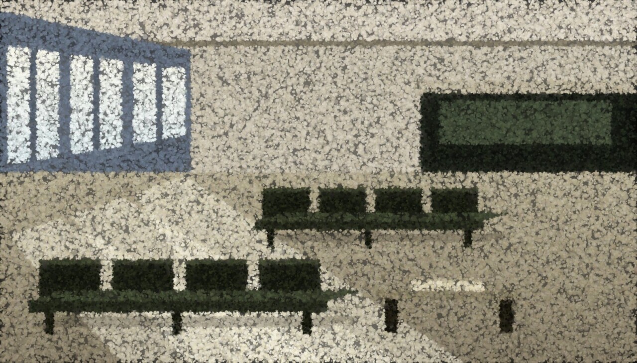A clinic waiting room with rows of empty chairs, tall windows along one wall and a screen on the far wall.