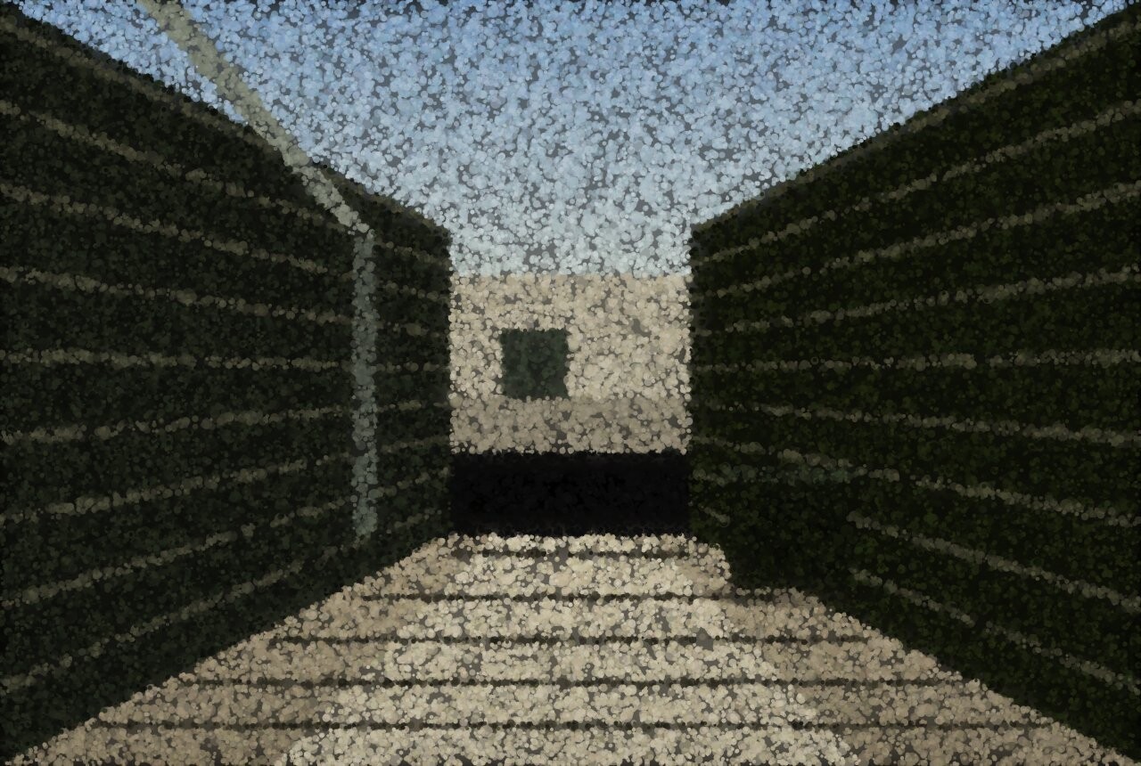 A narrow alley running between two dark building walls toward a small lit facade at the far end.