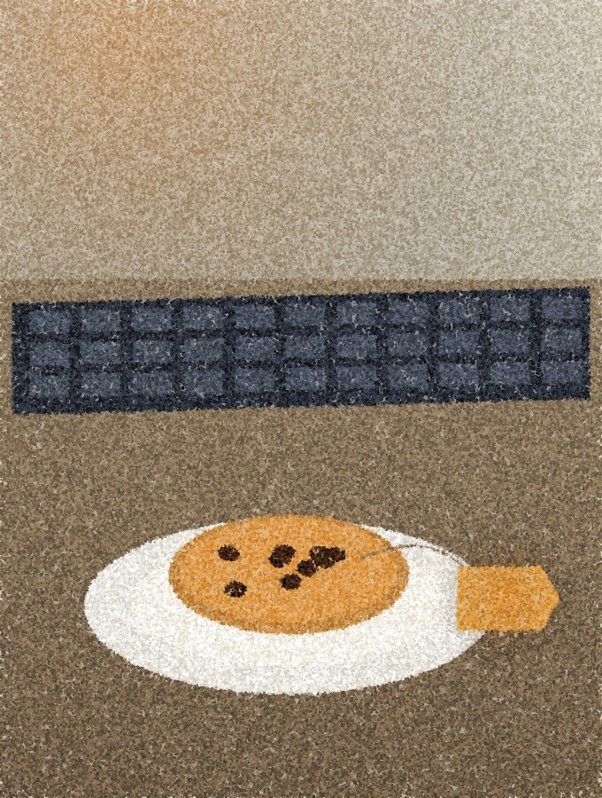 A pointillist illustration: a small round cookie on a saucer beside a keyboard, with a tiny amber tag attached by a thread.