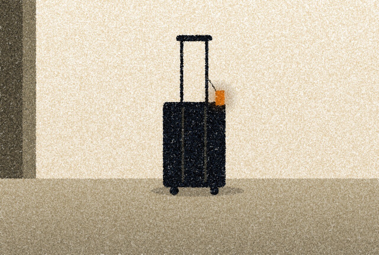 A pointillist illustration: a dark suitcase with its handle extended, standing alone on a pale floor near the edge of a doorway, a small amber luggage tag hanging from the handle.