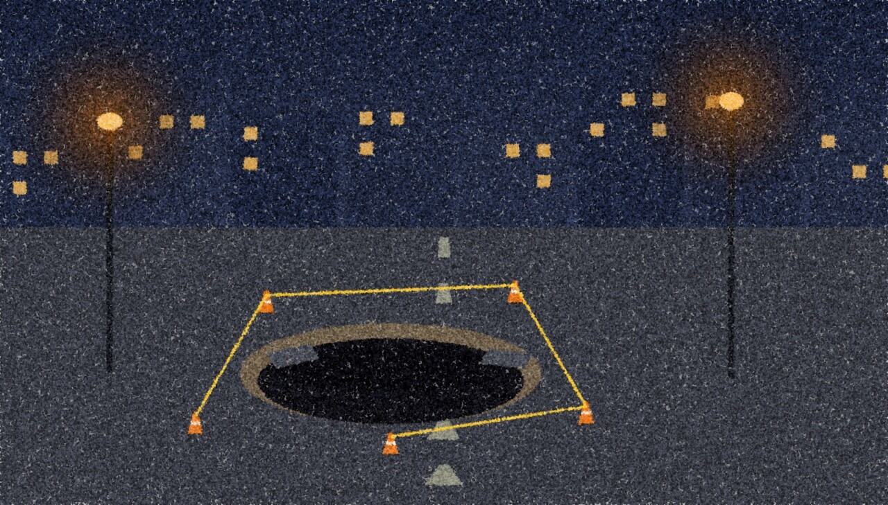 A pointillist illustration: a city road at night with a large dark hole in the asphalt, broken slabs at its edge, traffic cones joined by yellow tape, and two amber streetlamps.