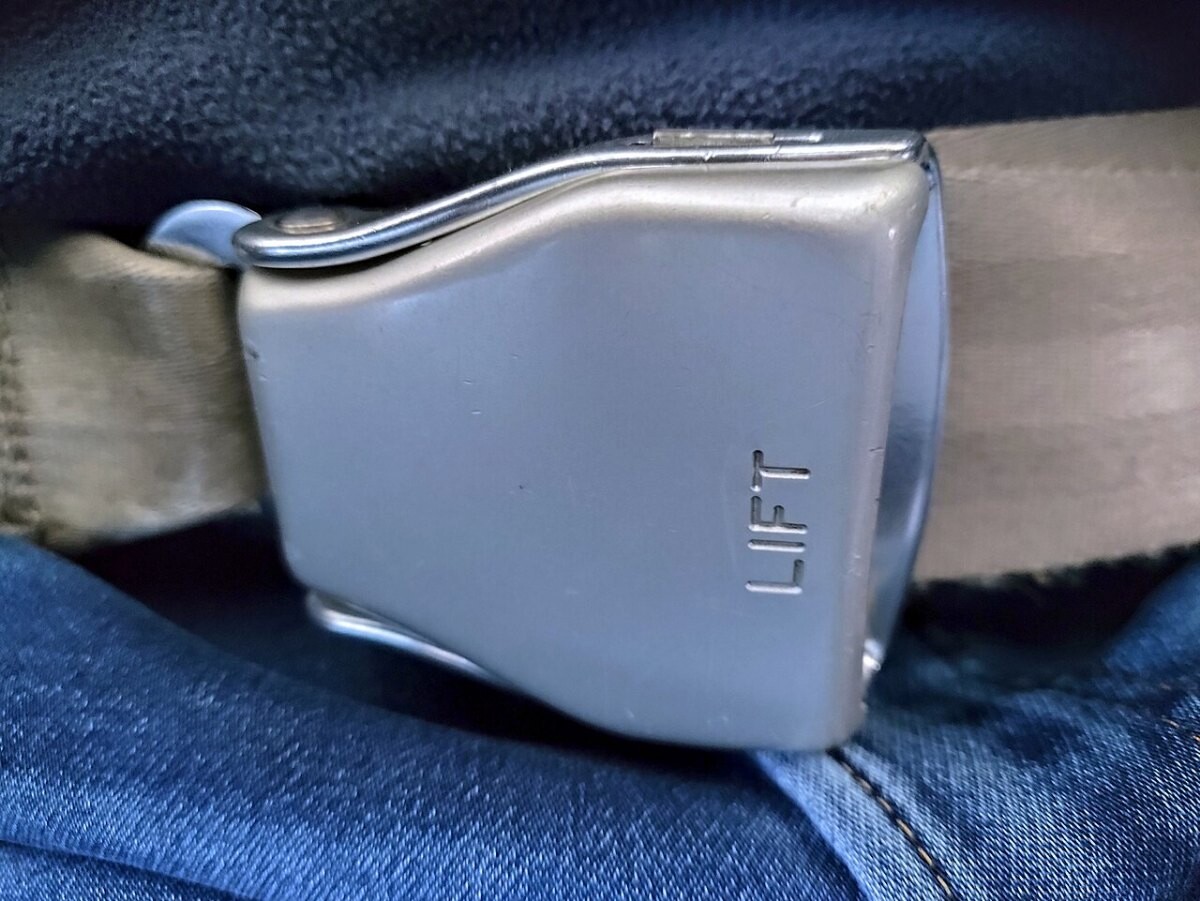A seat belt buckle