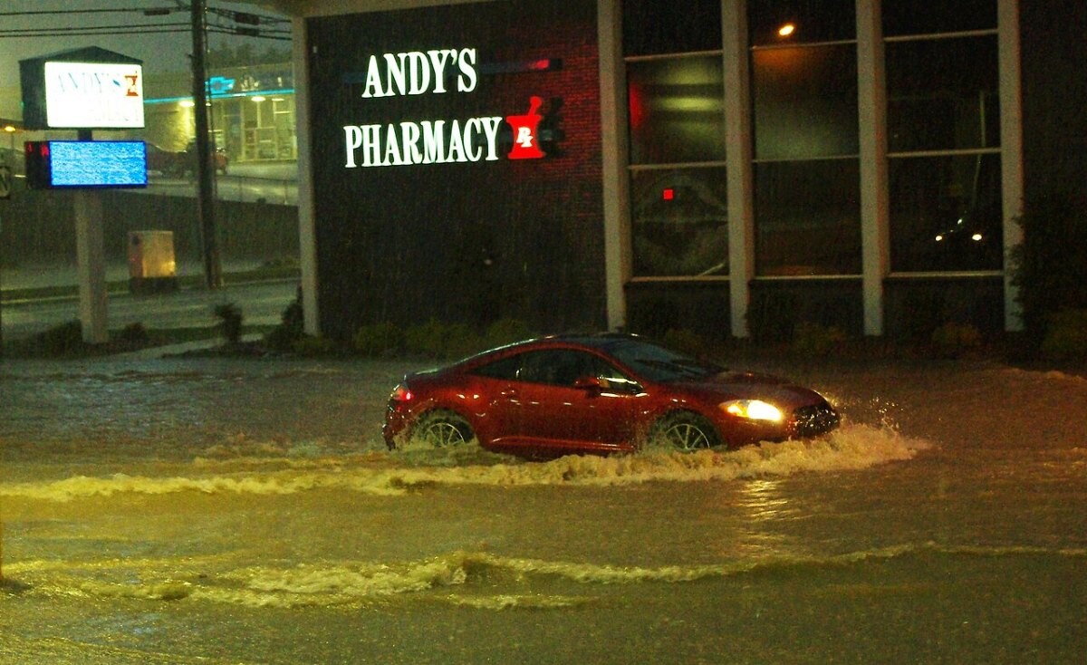 A car driving through flash floodwater in Cookeville, Tennessee