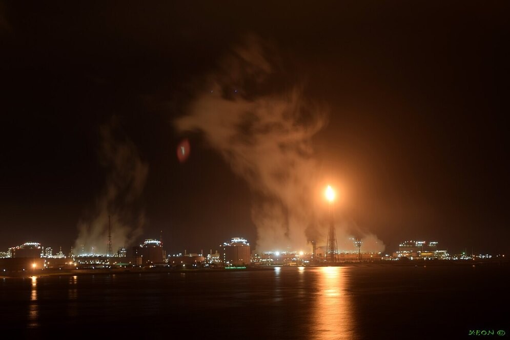 File photo of an industrial plant lit up at night