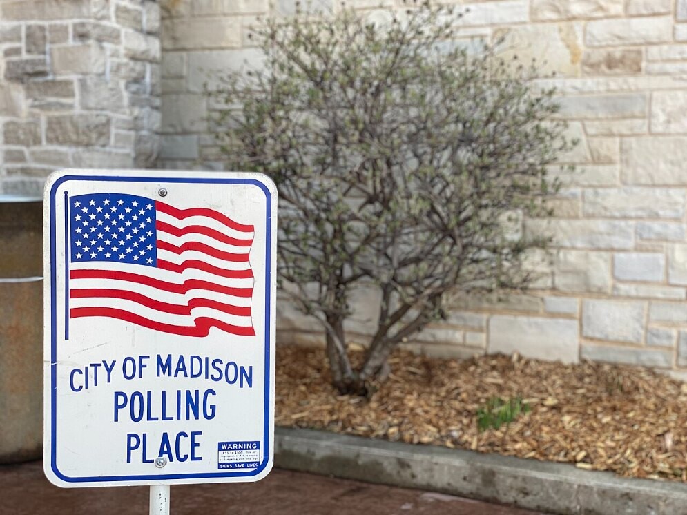 File photo: a polling place sign in Madison, Wisconsin