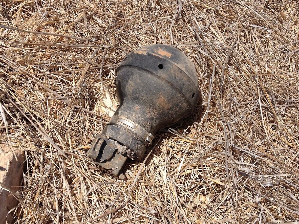 File photo of a spent tear gas canister on the ground
