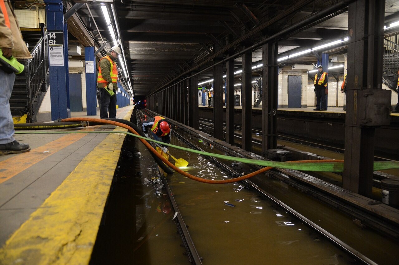 Flooded subway tracks after a water main broke in New York, April 2015