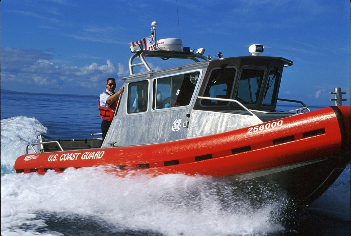 A US Coast Guard response boat speeding across the water